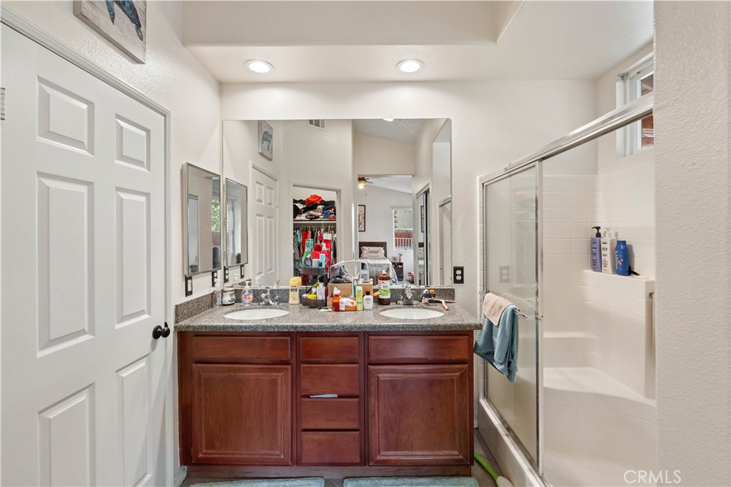 236 Jam Street Hemet, CA 92544 - Photo 27 of 36 a bathroom with a sink vanity and a mirror