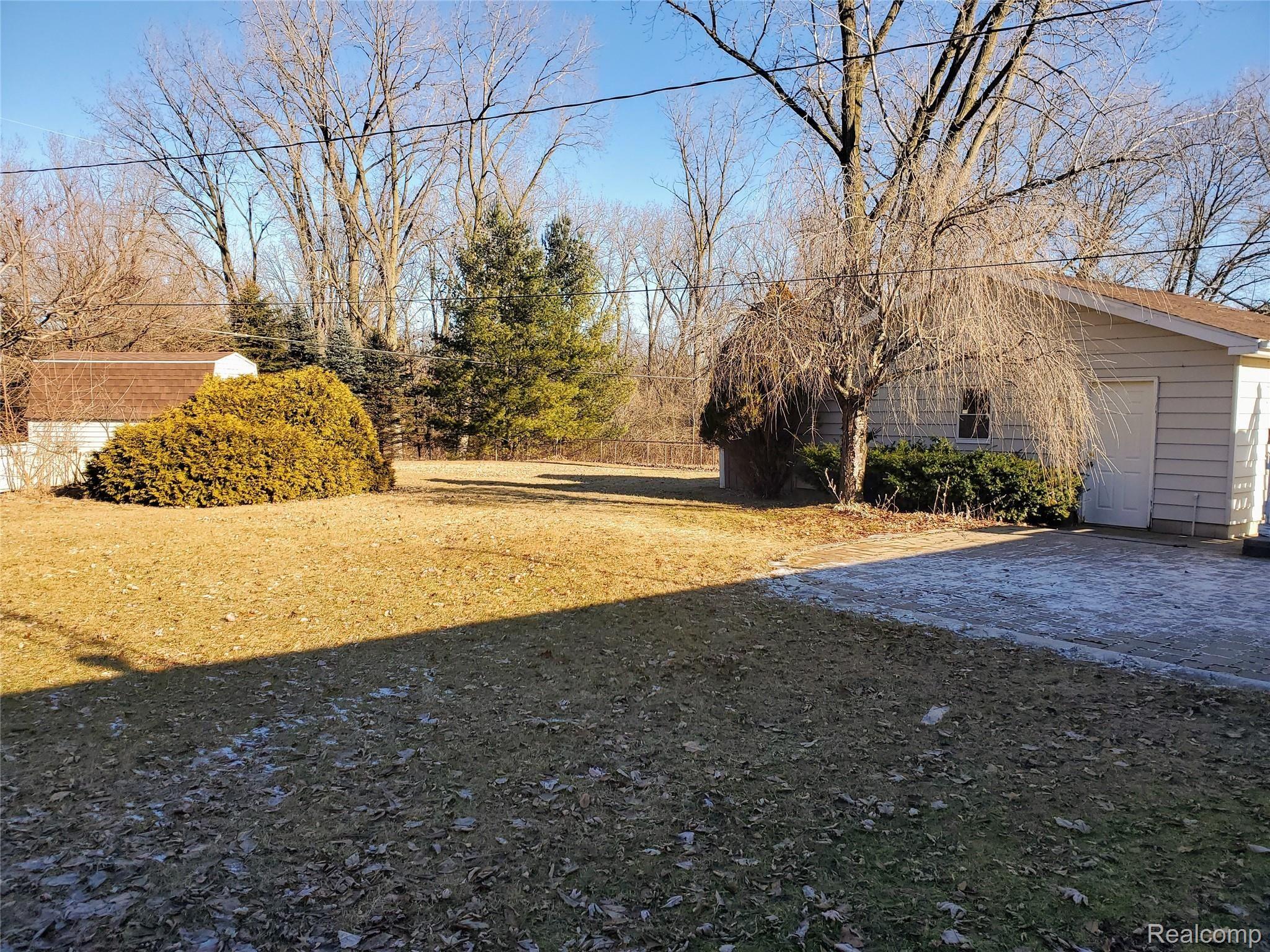 8387 East Baldwin Road Goodrich, MI 48438 - Photo 2 of 26 Baldwin Backyard Brick Patio Gar and Yard.jpg