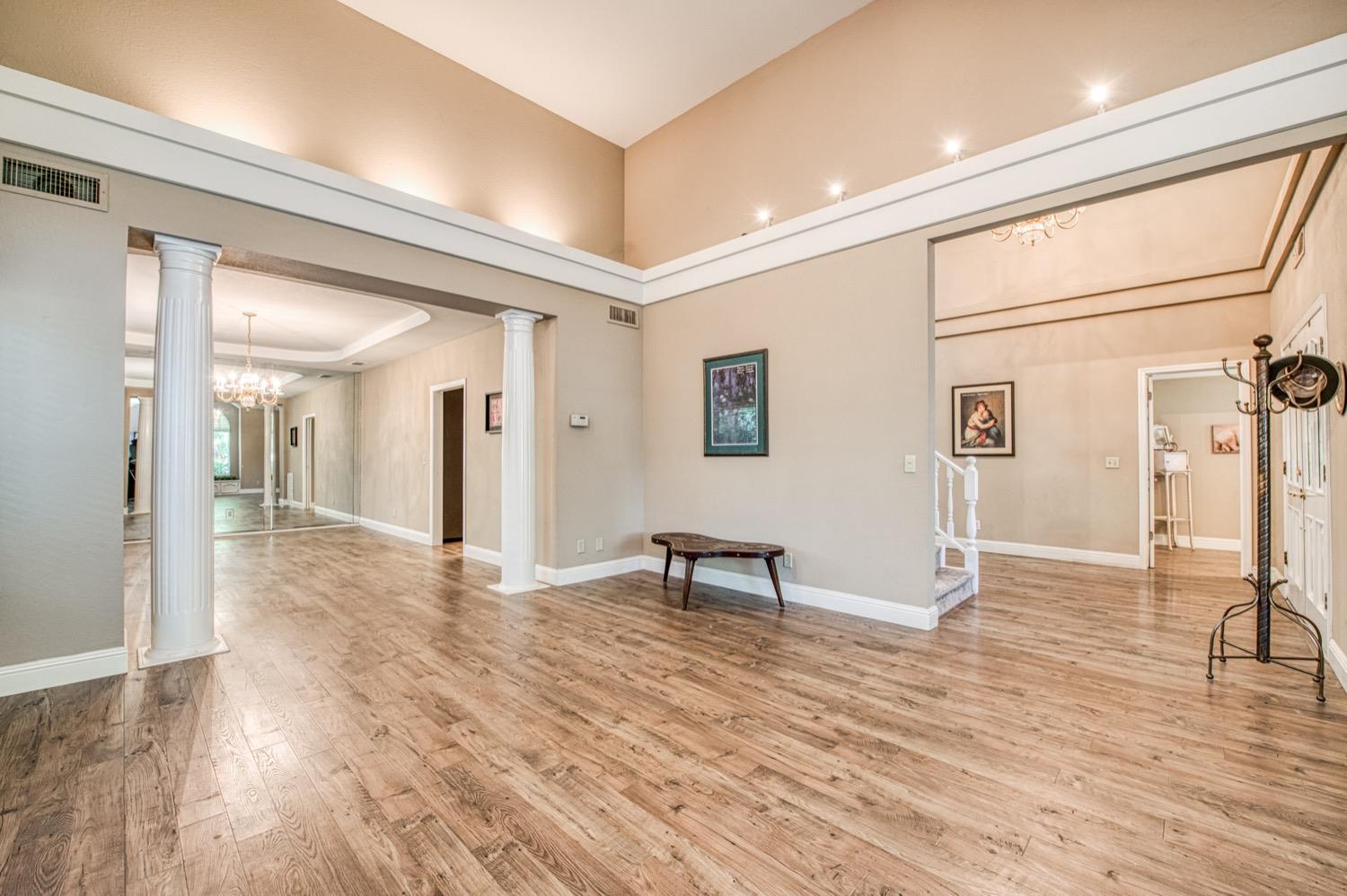 205 West Ridgepoint Drive Fresno, CA 93711 - Photo 11 of 49 a view of a livingroom with wooden floor and furniture