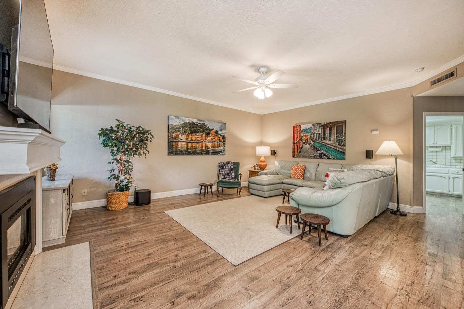 205 West Ridgepoint Drive Fresno, CA 93711 - Photo 15 of 49 a living room with furniture and a fireplace