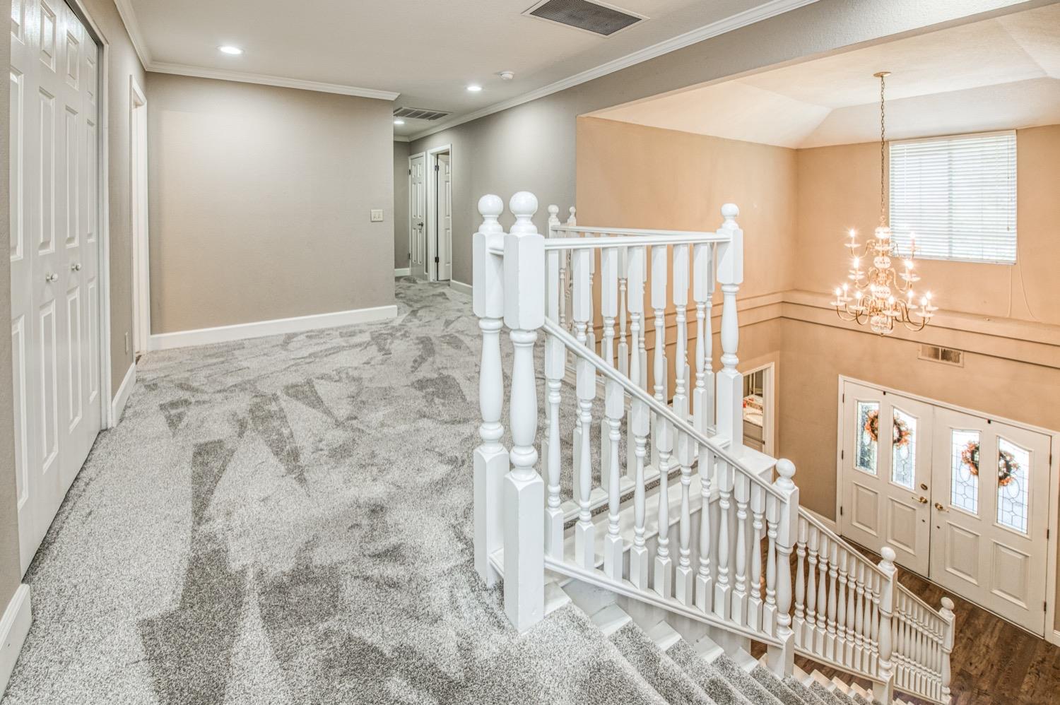 205 West Ridgepoint Drive Fresno, CA 93711 - Photo 26 of 49 a view of an entryway with wooden floor