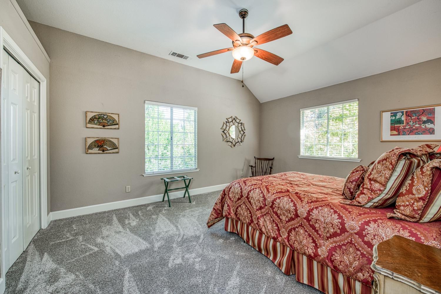 205 West Ridgepoint Drive Fresno, CA 93711 - Photo 27 of 49 a bedroom with a bed and a window