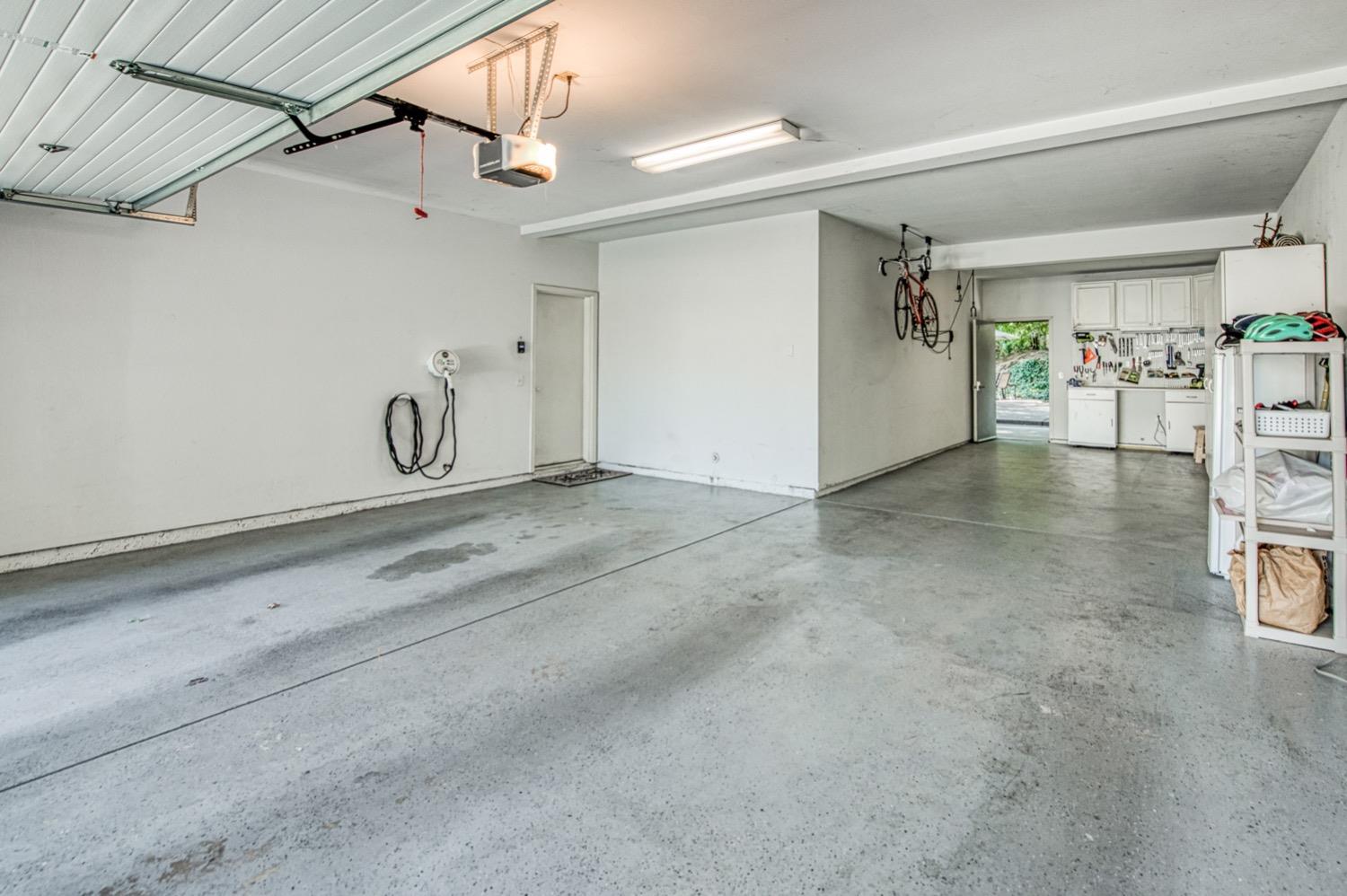 205 West Ridgepoint Drive Fresno, CA 93711 - Photo 41 of 49 a view of a garage with furniture