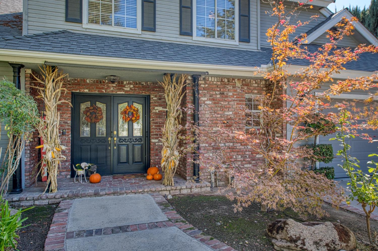 205 West Ridgepoint Drive Fresno, CA 93711 - Photo 5 of 49 a view of a front door of the house