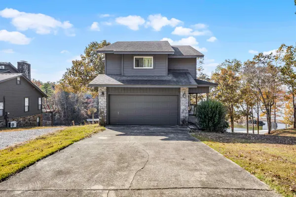 a view of a two chairs in the balcony