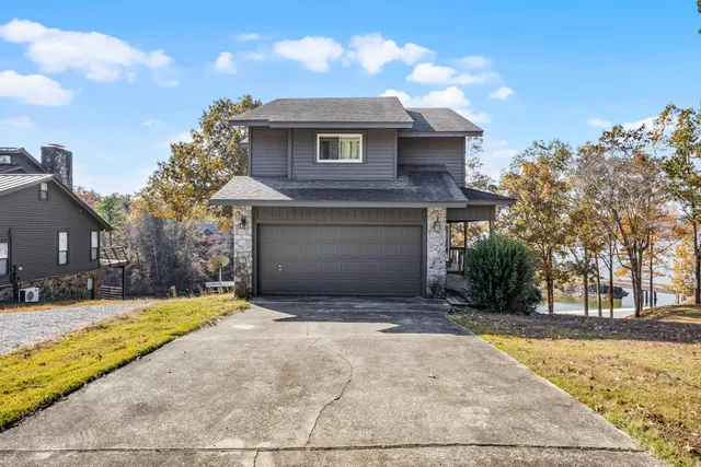 a view of a two chairs in the balcony