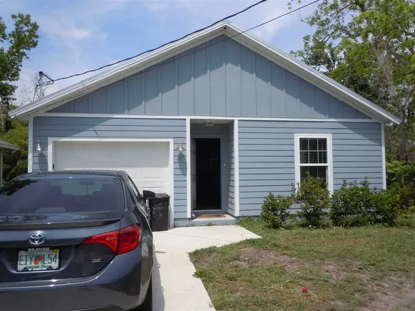 a house view with a outdoor space