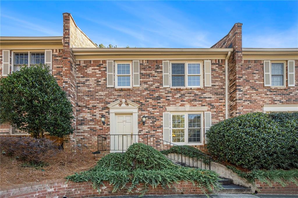 1465 Leafmore Ridge Decatur, GA 30033 - Photo 1 of 1 front view of a brick house with a large windows