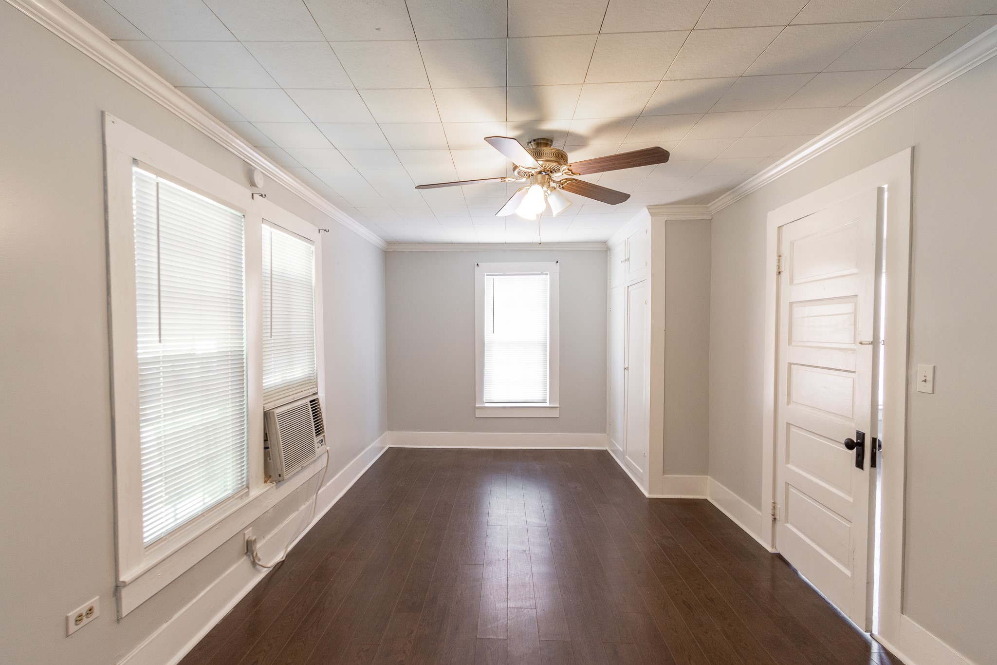 308 West Sidnor Street Alvin, TX 77511 - Photo 12 of 17 Ceiling fans keep bedroom cool