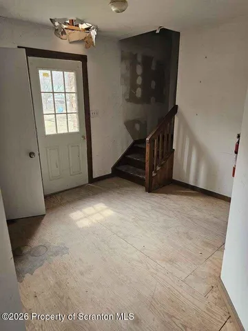 an empty room with windows