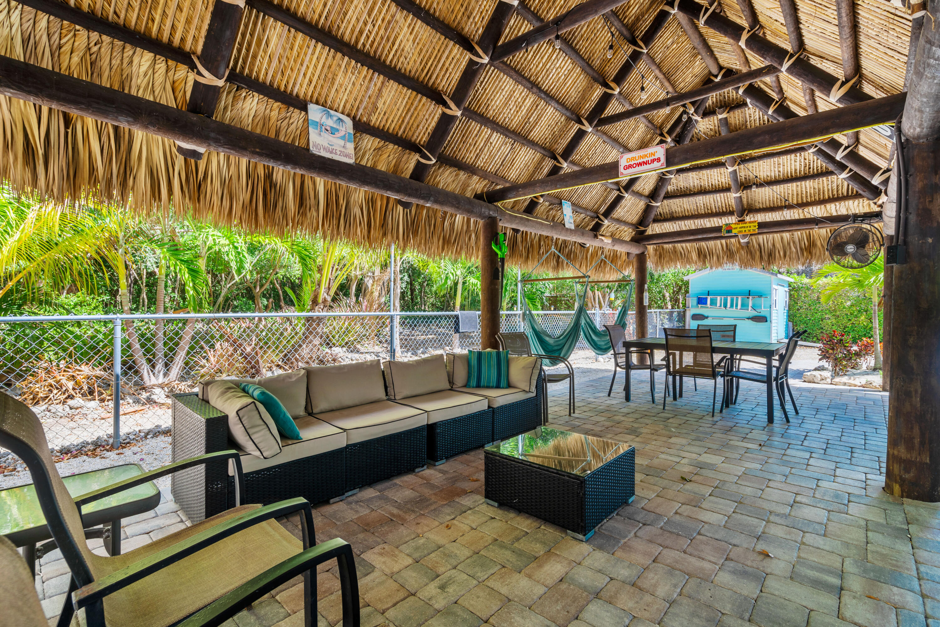 312 Ryan Avenue Key Largo, FL 33037 - Photo 30 of 47 a outdoor living space with furniture and garden view