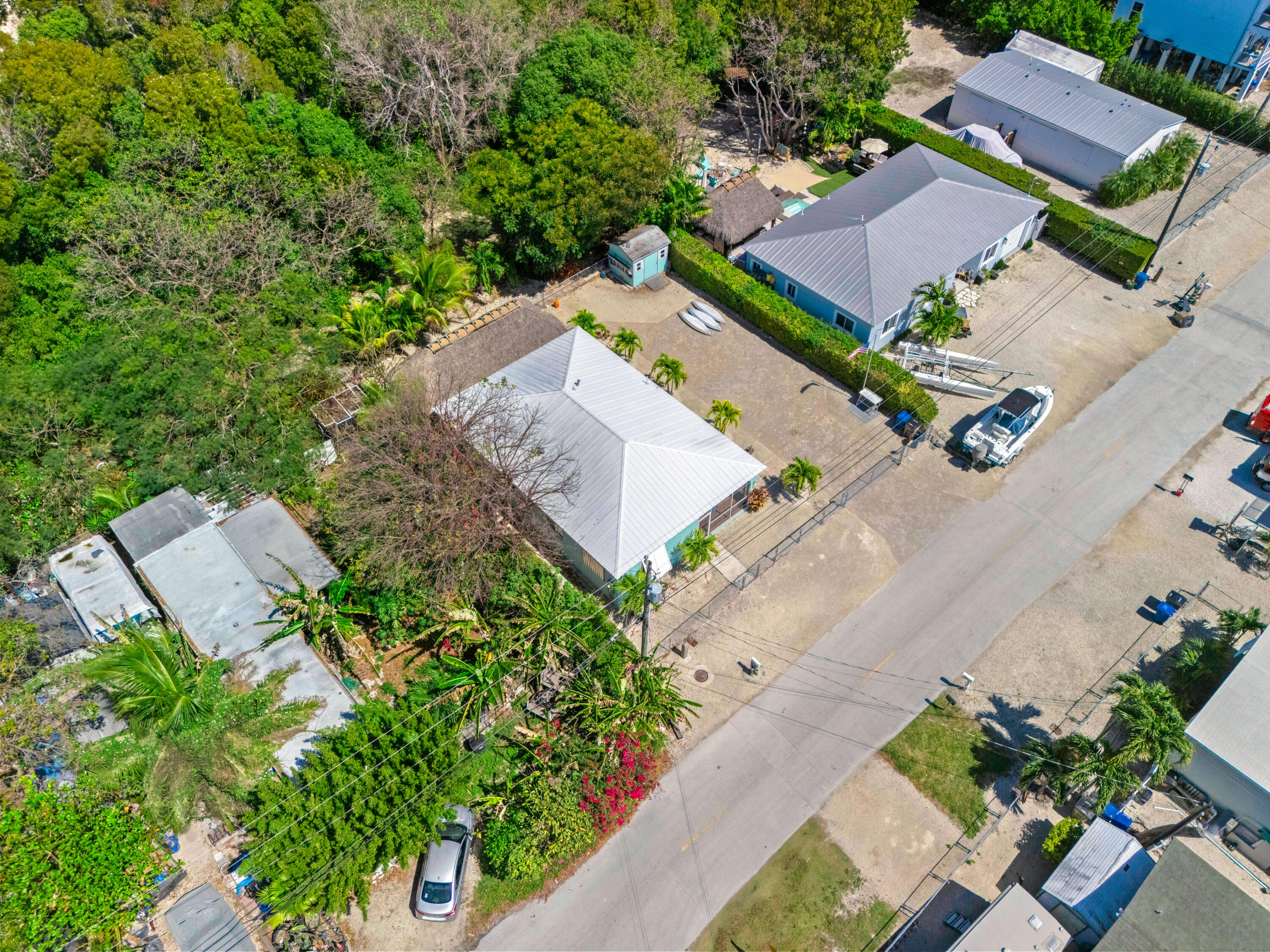 312 Ryan Avenue Key Largo, FL 33037 - Photo 38 of 47 an aerial view of a house with a yard and a large tree
