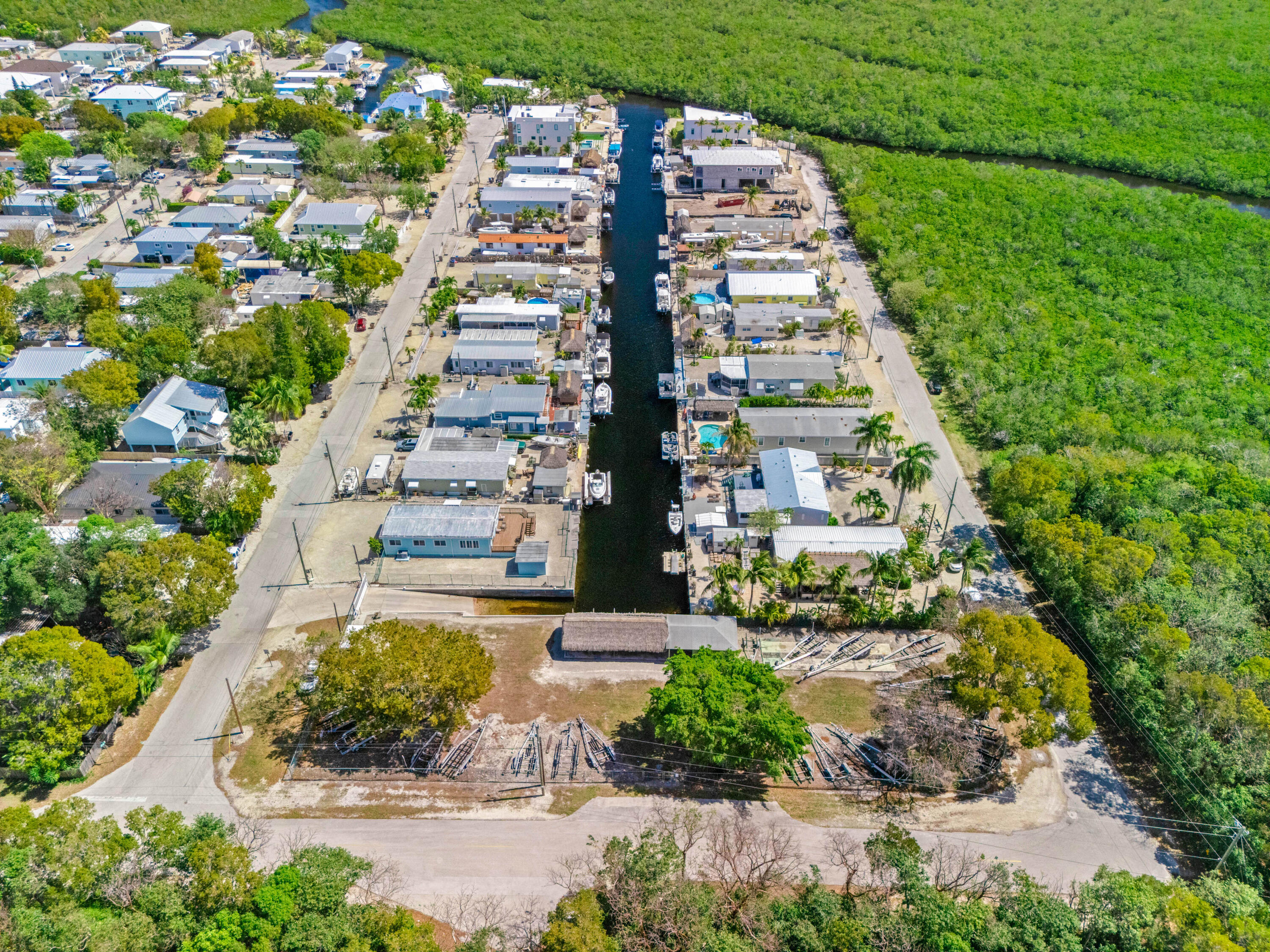 312 Ryan Avenue Key Largo, FL 33037 - Photo 46 of 47 a view of a large building with a yard