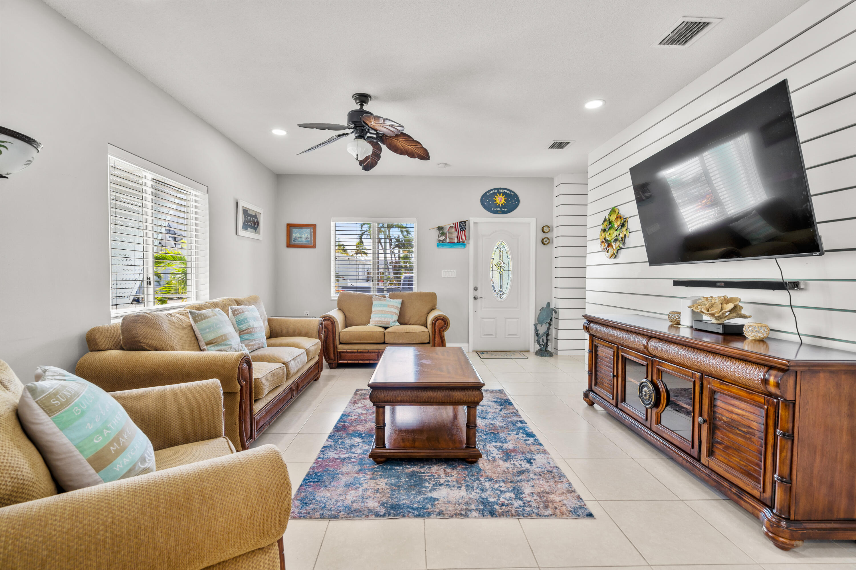 312 Ryan Avenue Key Largo, FL 33037 - Photo 7 of 47 a living room with furniture and a flat screen tv