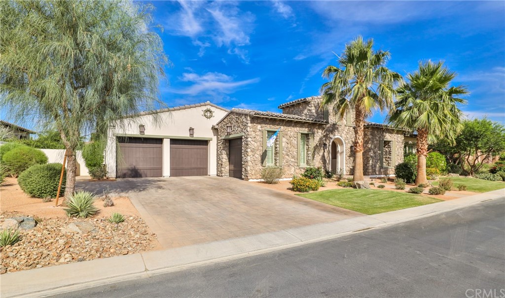 81094 Monarchos Circle La Quinta, CA 92253 - Photo 1 of 43 front view of a house with a yard
