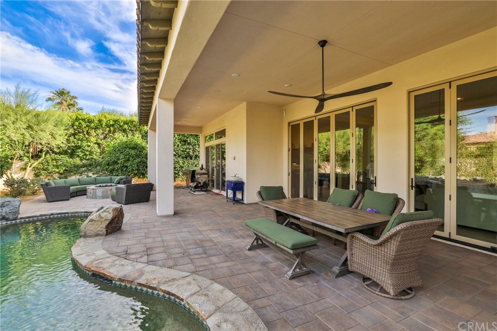 81094 Monarchos Circle La Quinta, CA 92253 - Photo 27 of 43 a outdoor space with lots of furniture and garden