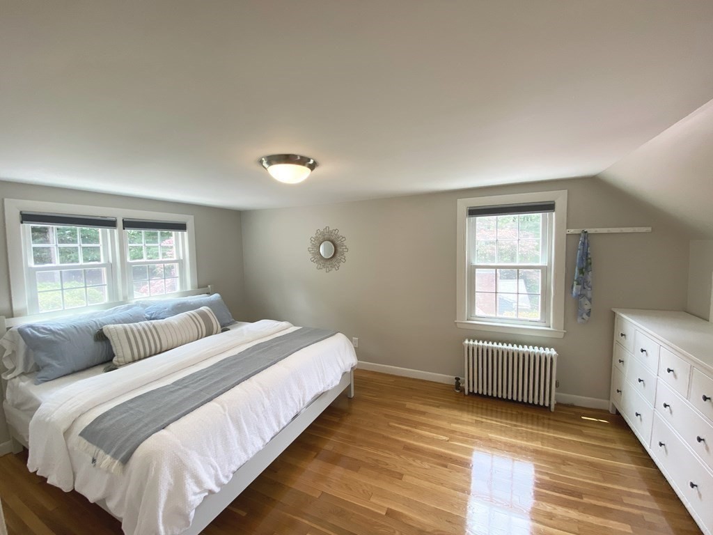 13 Pine Knoll Road Lexington, MA 02420 - Photo 14 of 24 a bedroom with two beds and a window