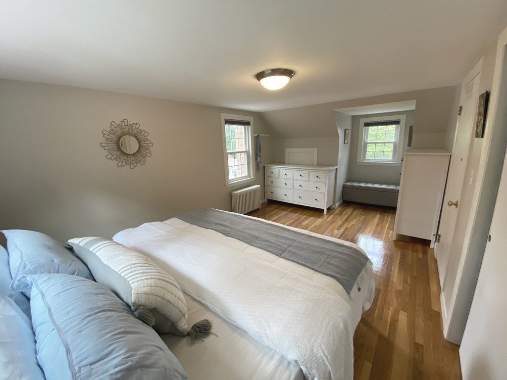 13 Pine Knoll Road Lexington, MA 02420 - Photo 15 of 24 a bedroom with a bed and window