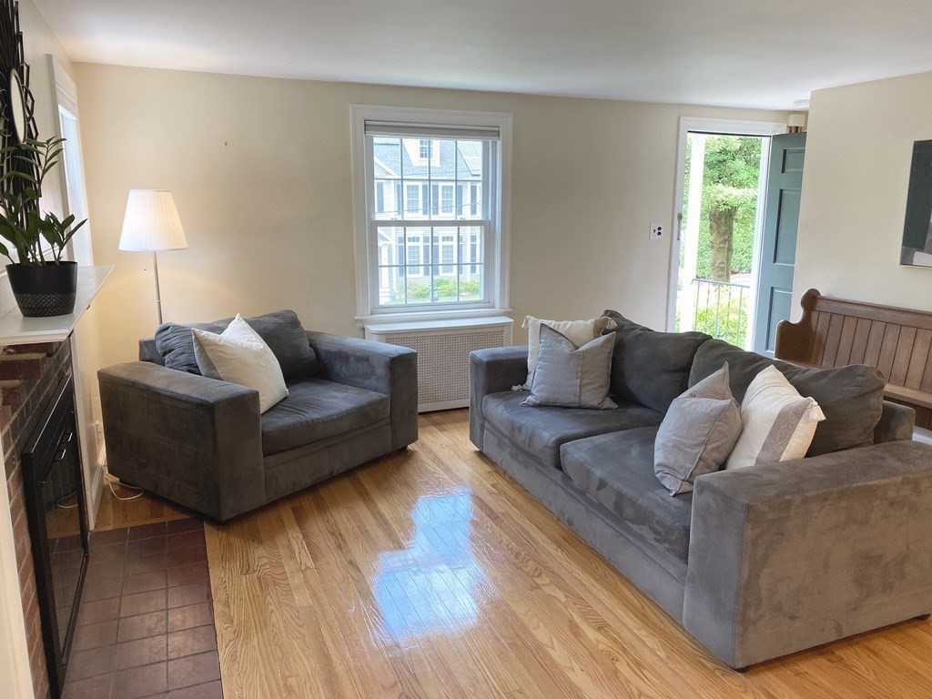 13 Pine Knoll Road Lexington, MA 02420 - Photo 4 of 24 a living room with furniture and a couch