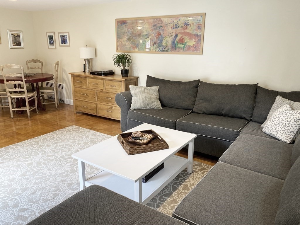 13 Pine Knoll Road Lexington, MA 02420 - Photo 8 of 24 a living room with furniture and a rug