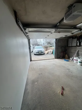 a view of large trees with yard