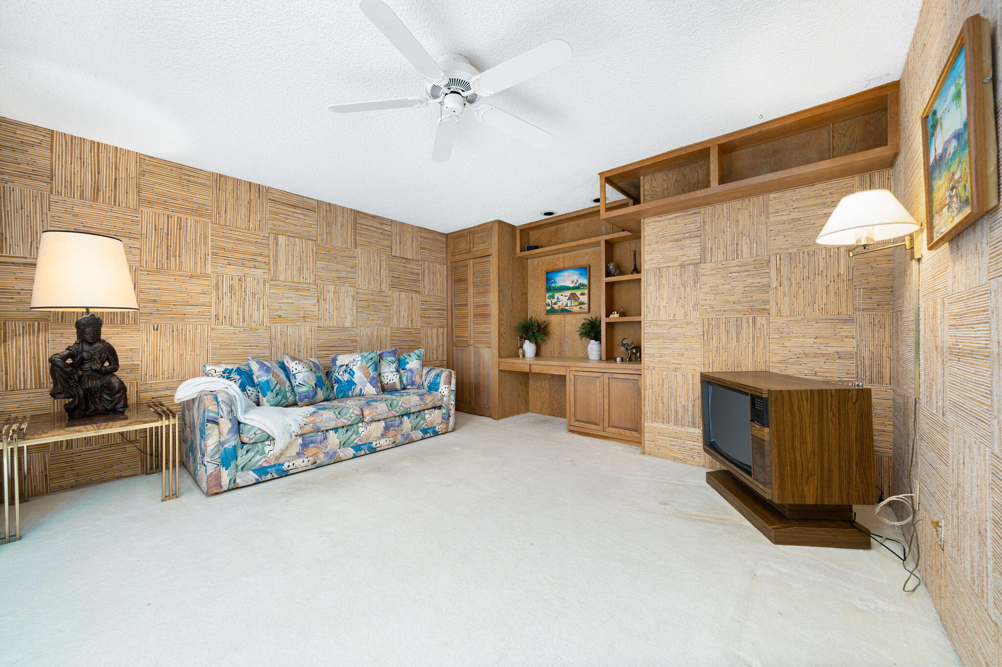 7 Leon Way Rancho Mirage, CA 92270 - Photo 19 of 45 a bedroom with bed and a fireplace