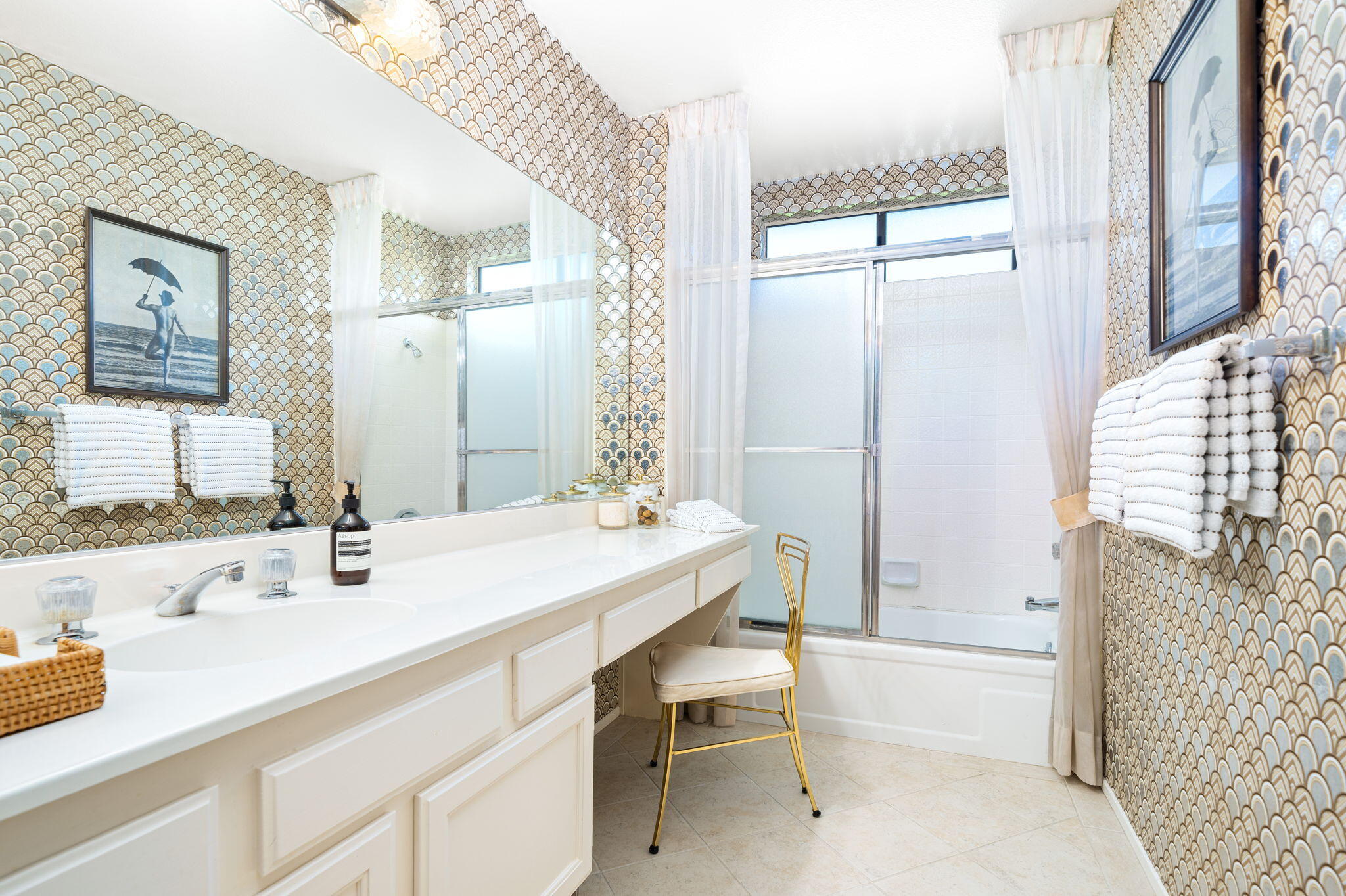 7 Leon Way Rancho Mirage, CA 92270 - Photo 21 of 45 a bathroom with a sink and a mirror
