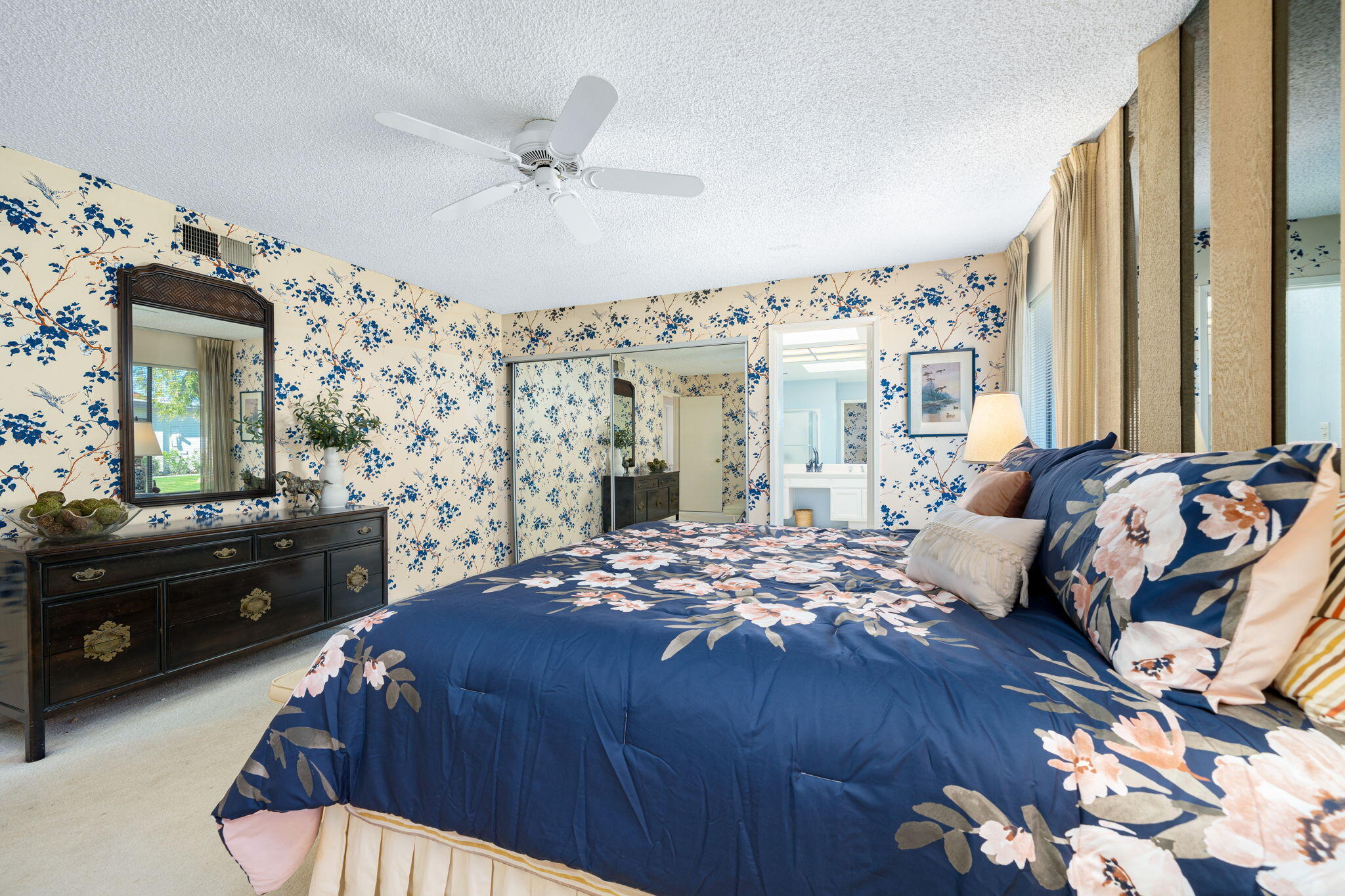 7 Leon Way Rancho Mirage, CA 92270 - Photo 23 of 45 a bedroom with a bed dresser and window