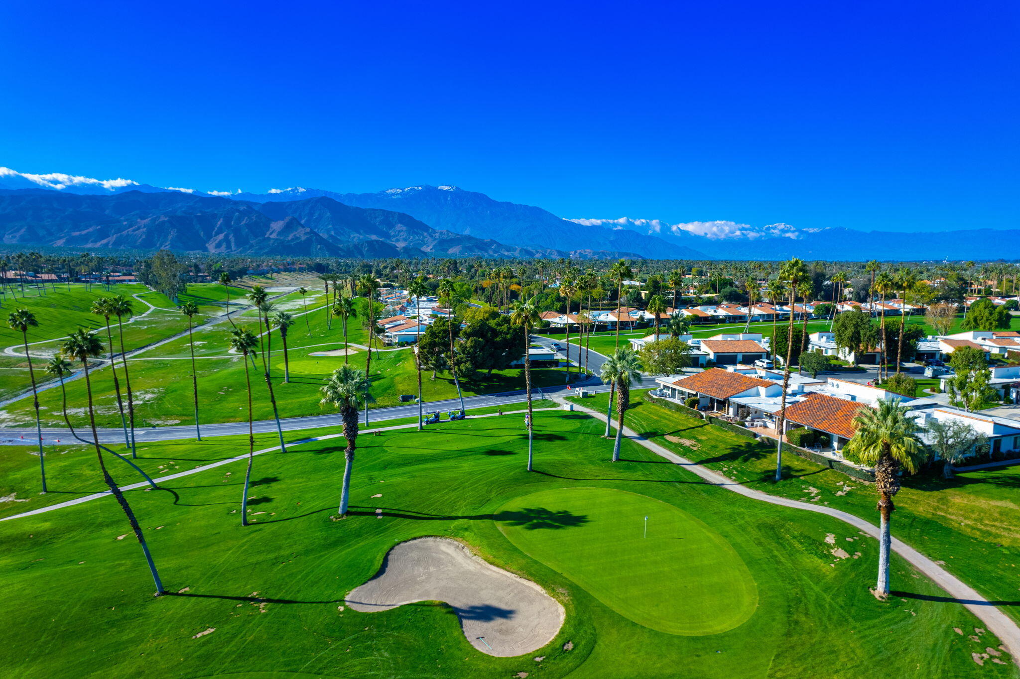 7 Leon Way Rancho Mirage, CA 92270 - Photo 39 of 45 a view of a golf course with chairs