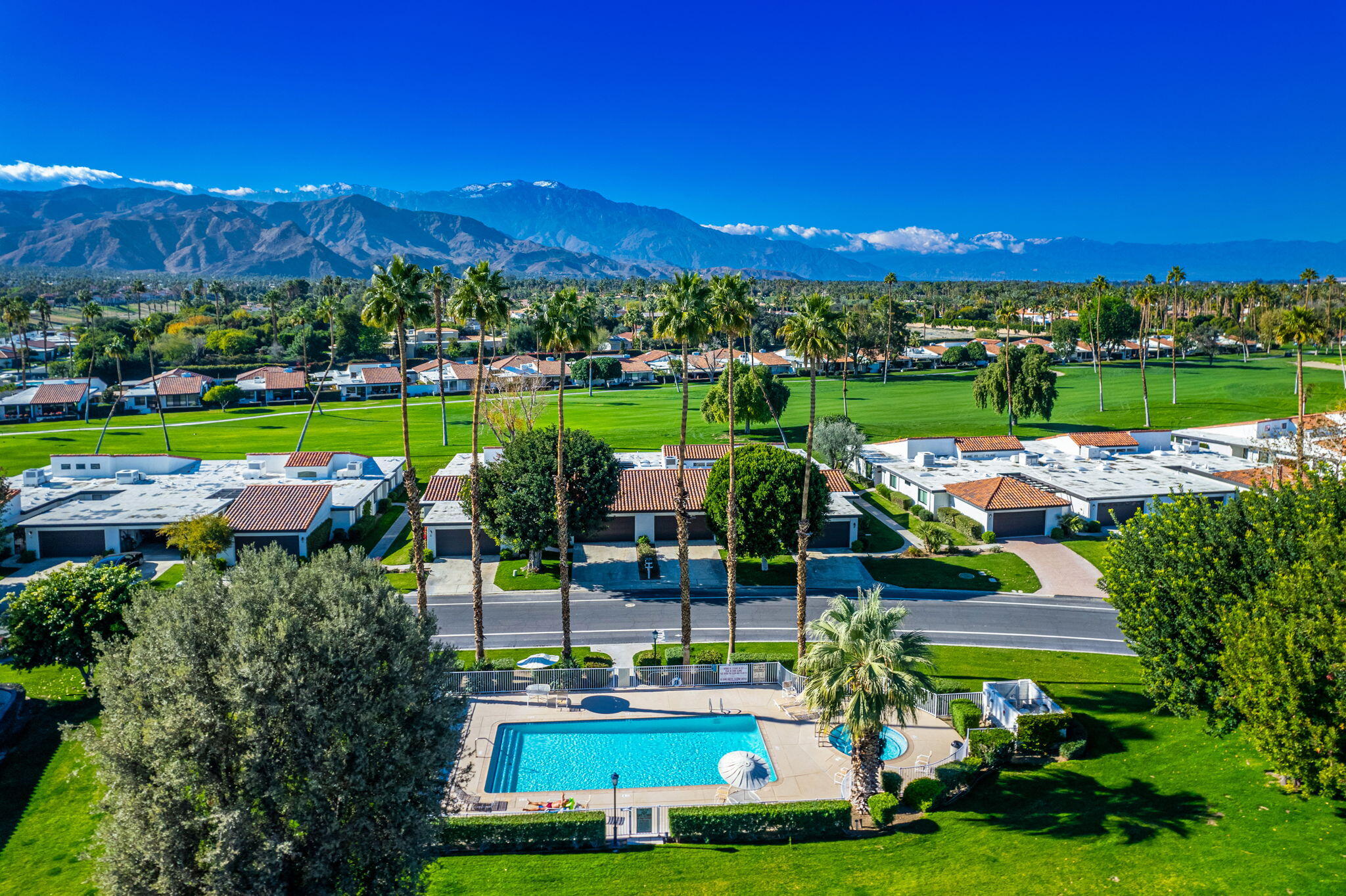 7 Leon Way Rancho Mirage, CA 92270 - Photo 42 of 45 a view of a city with lots of green space and mountain view in back