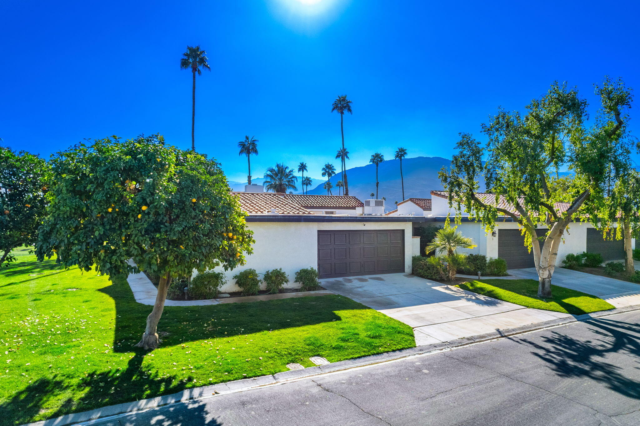 7 Leon Way Rancho Mirage, CA 92270 - Photo 5 of 45 a house view with a garden space