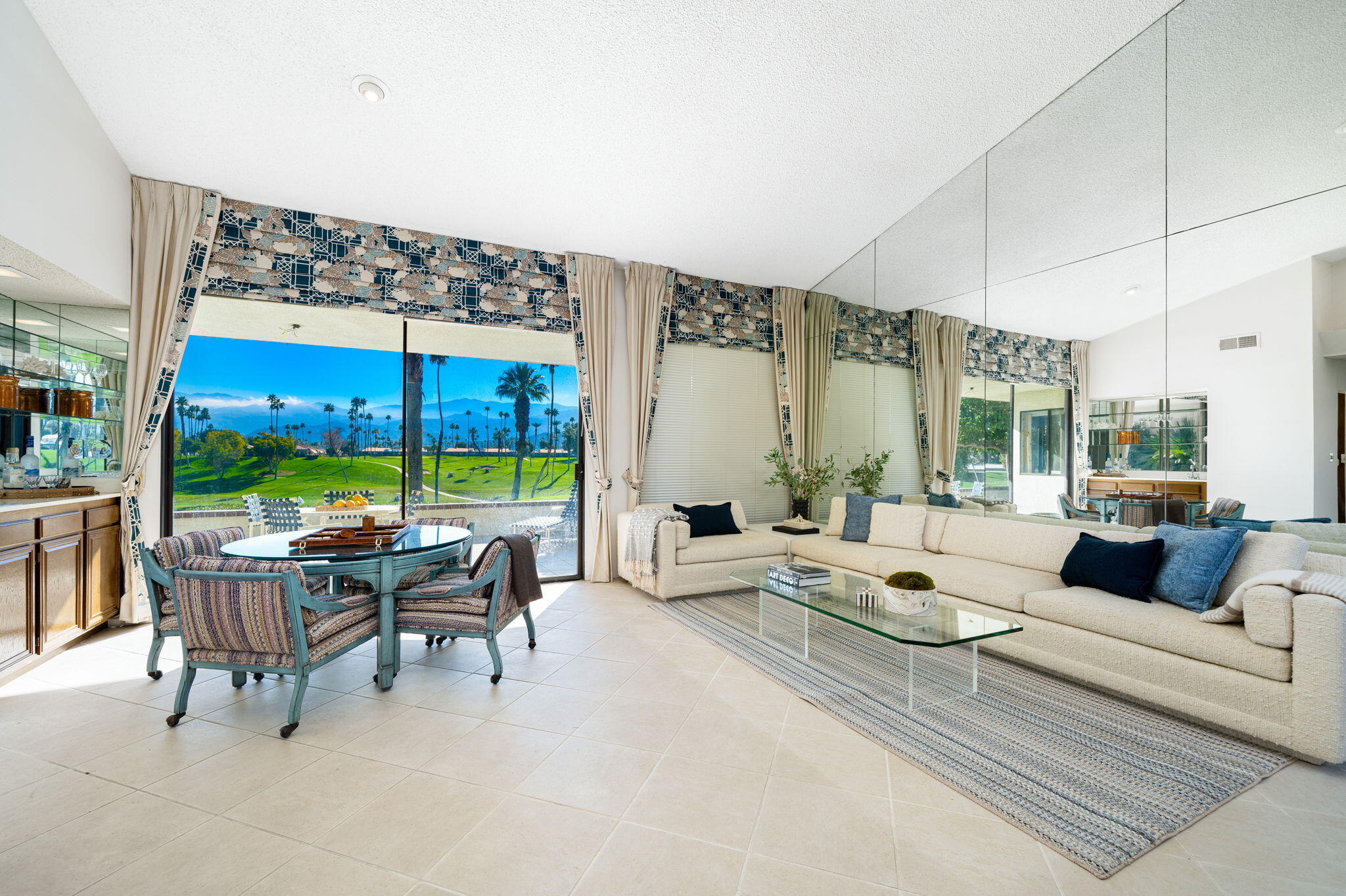 7 Leon Way Rancho Mirage, CA 92270 - Photo 9 of 45 a living room with furniture and a large window