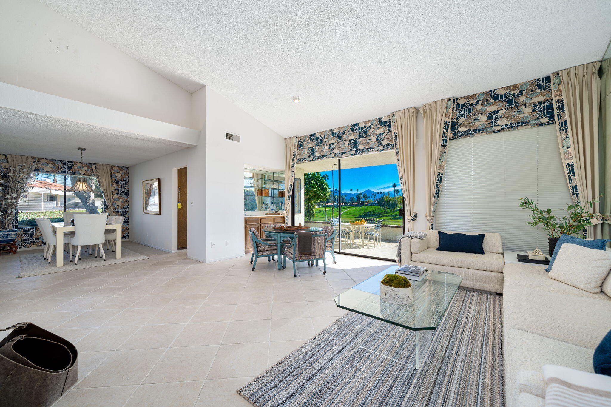 7 Leon Way Rancho Mirage, CA 92270 - Photo 10 of 45 a living room with furniture and a flat screen tv