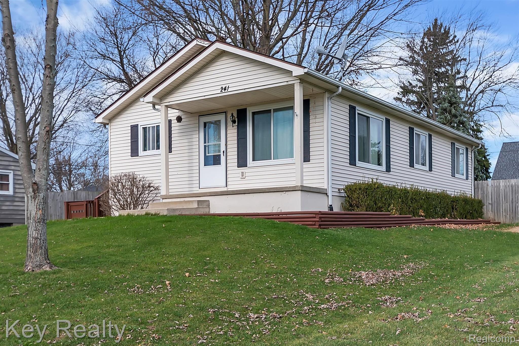 241 East Walnut Street Webberville, MI 48892 - Photo 2 of 41 02-241 E Walnut St-windowstill-real.jpg