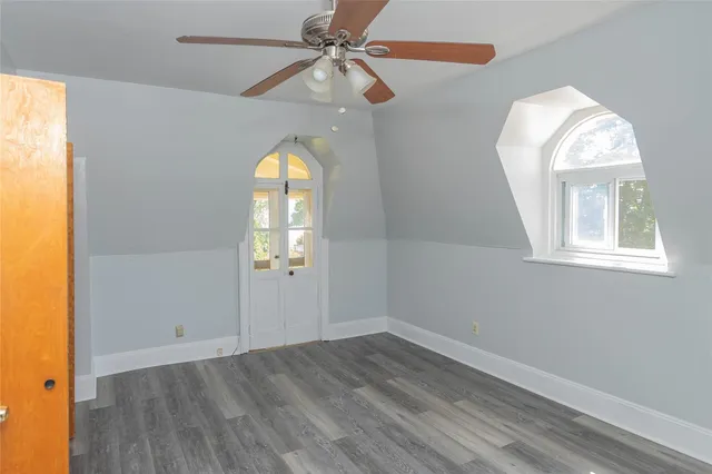 a bathroom with a sink and a window