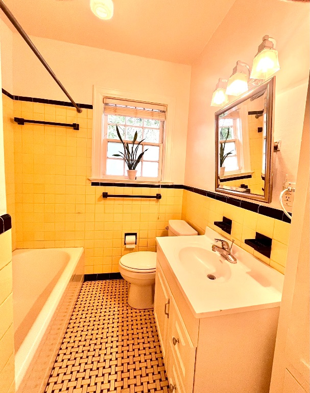 4501 Sinclair Avenue Austin, TX 78756 - Photo 14 of 21 a bathroom with a sink and a mirror