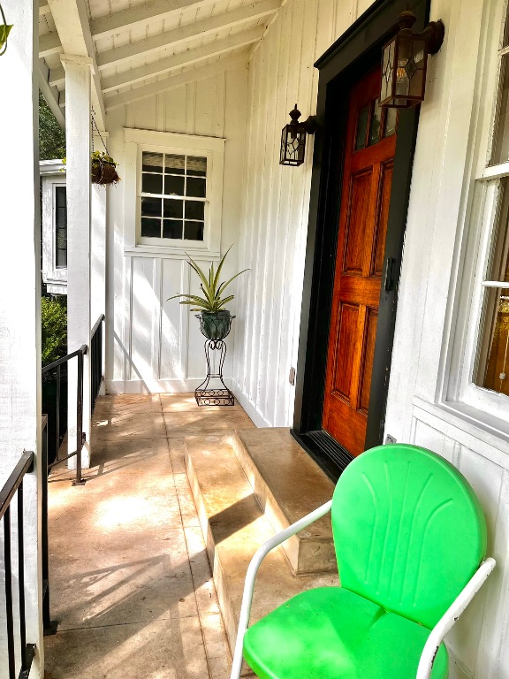 4501 Sinclair Avenue Austin, TX 78756 - Photo 3 of 21 a view of a porch with a table and chairs