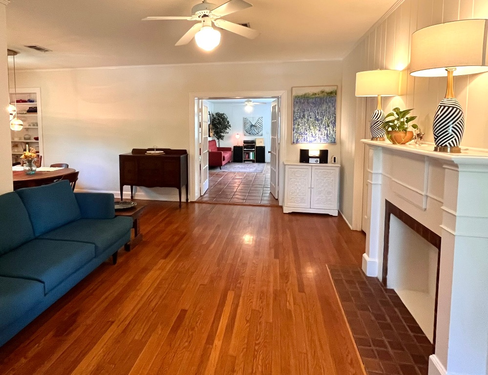 4501 Sinclair Avenue Austin, TX 78756 - Photo 4 of 21 a living room with furniture and a fireplace