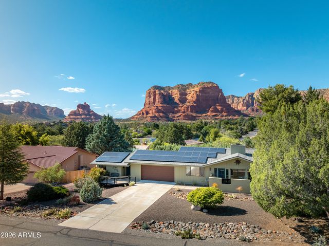an aerial view of a house with a garden