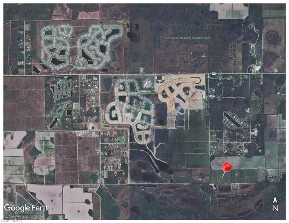 21991 Carter Road Estero, FL 33928 - Photo 2 of 15 a bathroom with a shower