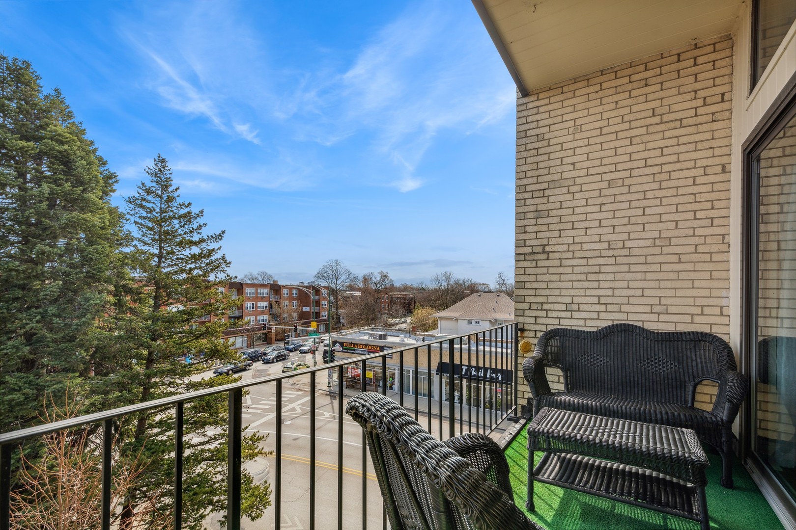 7200 North Ridge Boulevard, Unit 4E Chicago, IL 60645 - Photo 17 of 21 a view of a balcony with a chair