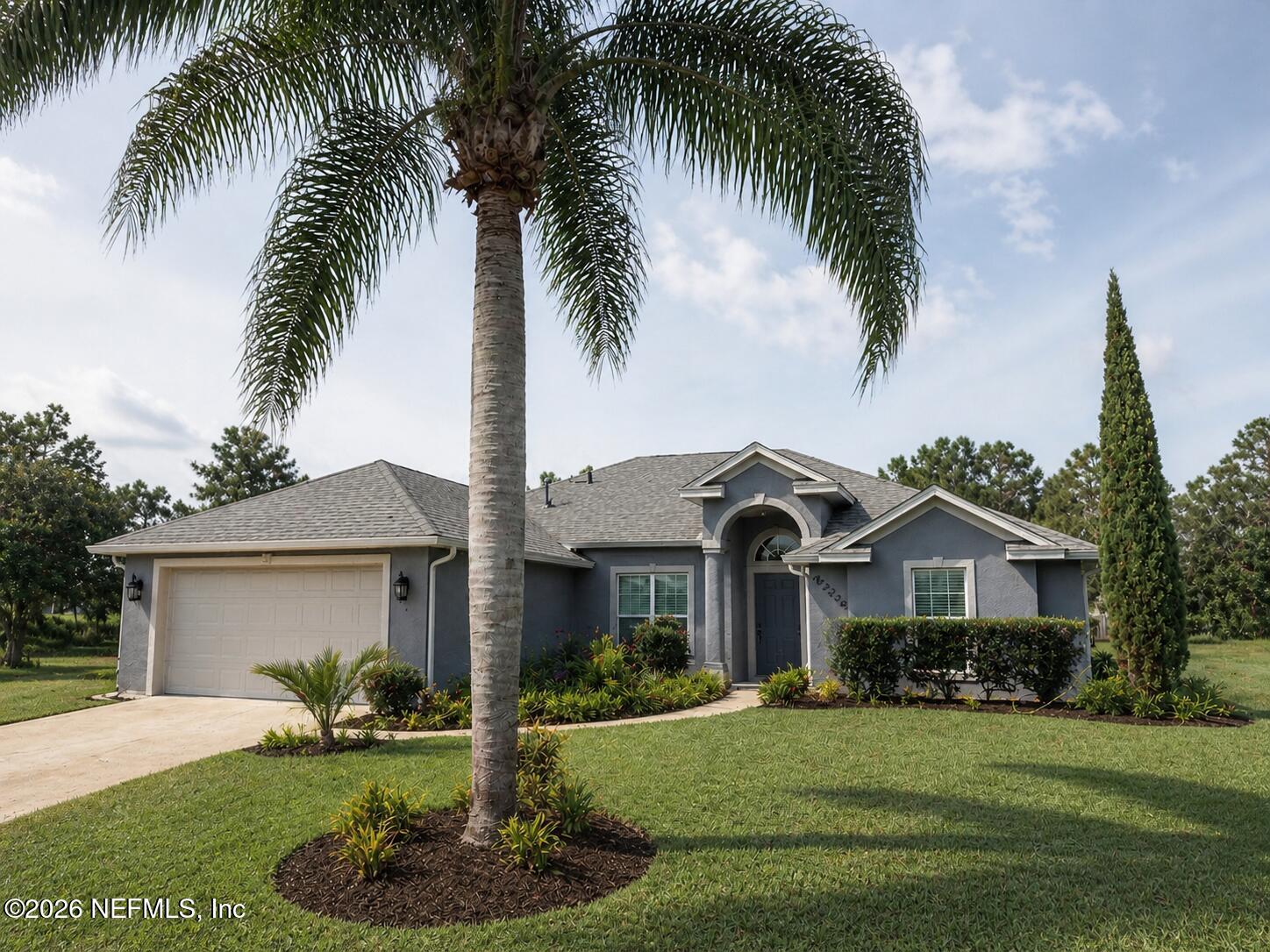 4728 Innisbrook Court North Elkton, FL 32033 - Photo 1 of 28 a front view of house with yard and green space