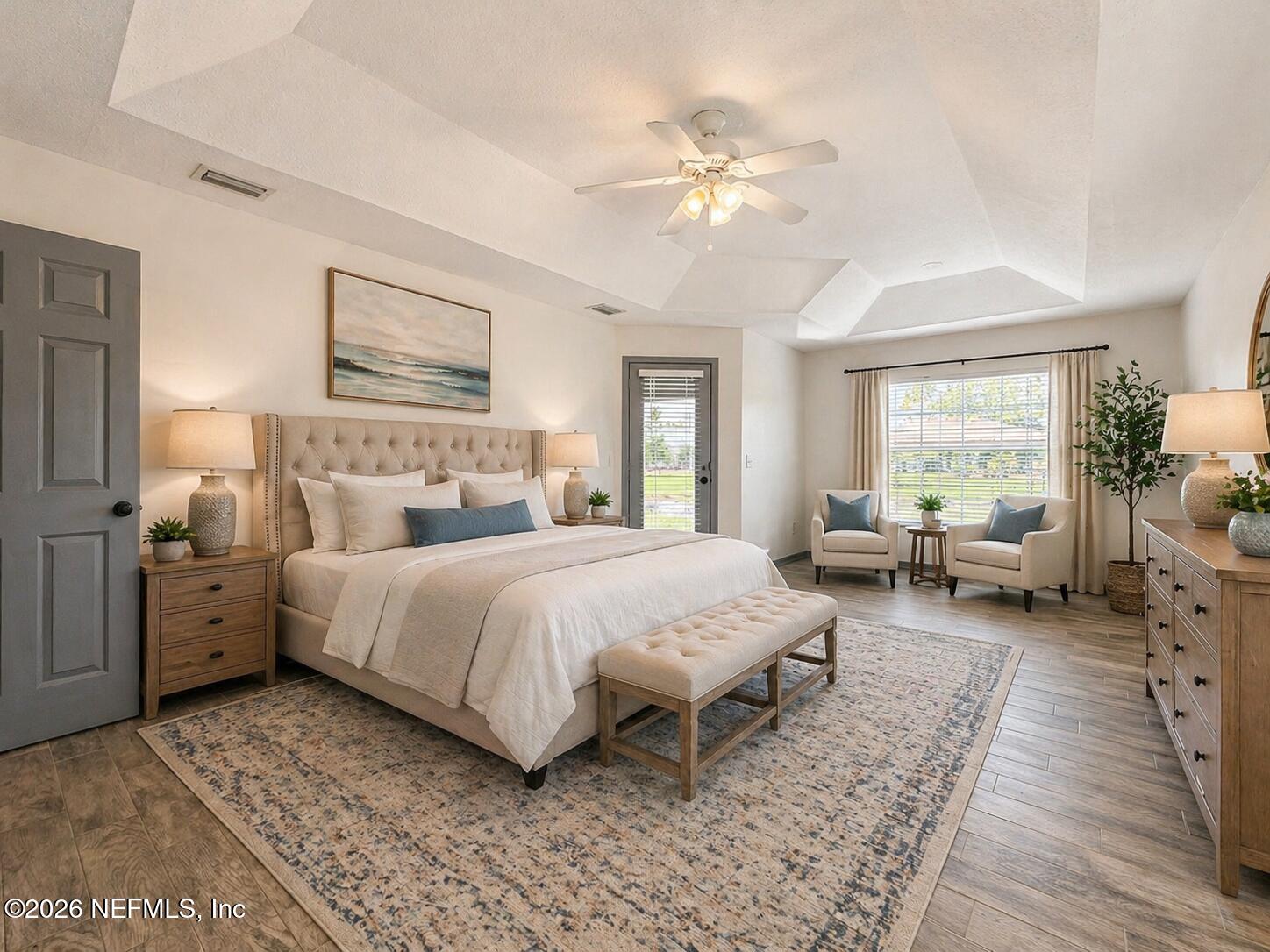 4728 Innisbrook Court North Elkton, FL 32033 - Photo 16 of 28 a bedroom with a bed and wooden floor