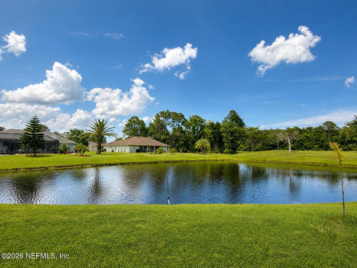 4728 Innisbrook Court North Elkton, FL 32033 - Photo 3 of 28 a view of a lake with a city