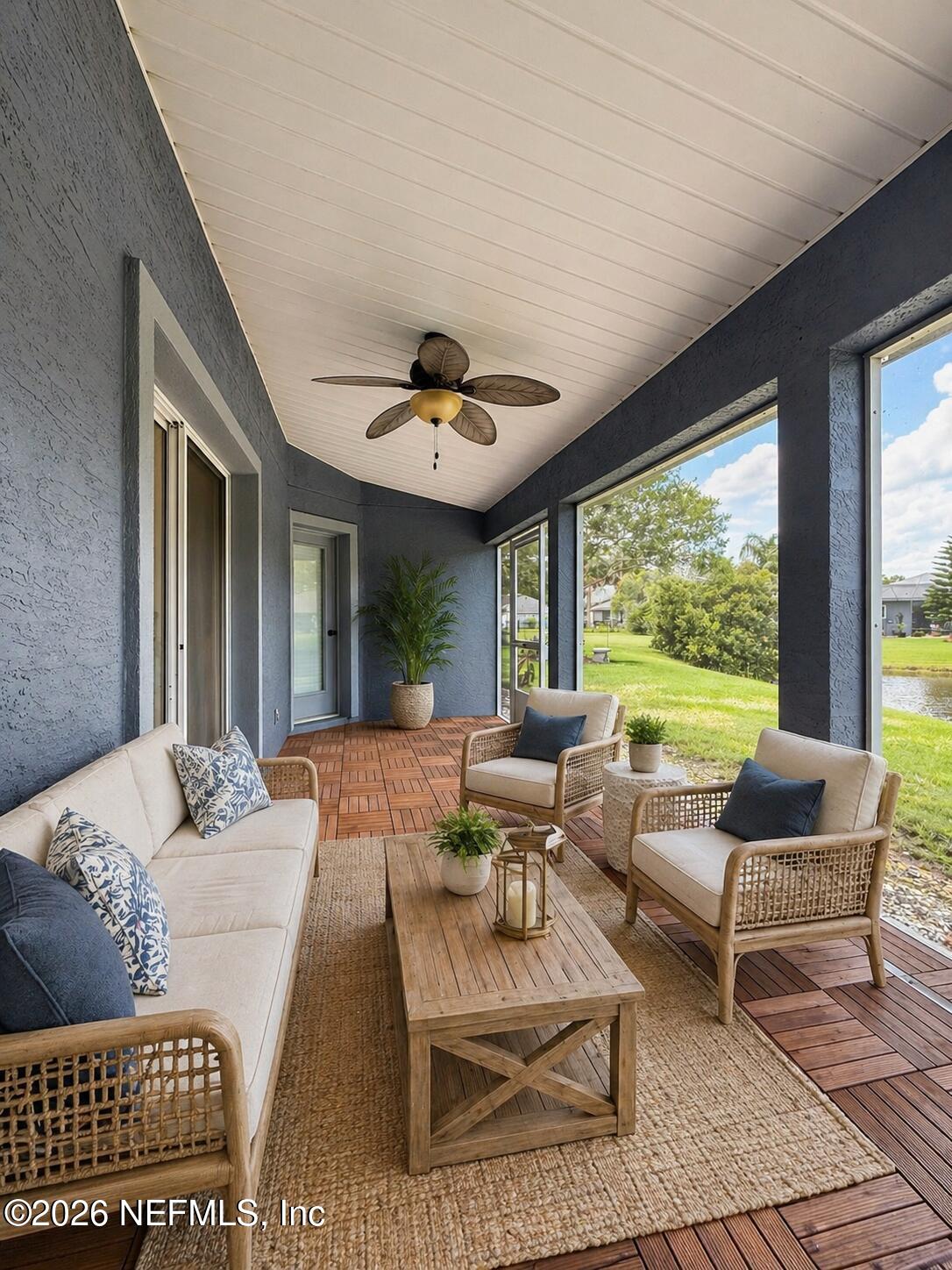 4728 Innisbrook Court North Elkton, FL 32033 - Photo 4 of 28 a living room with furniture and a large window
