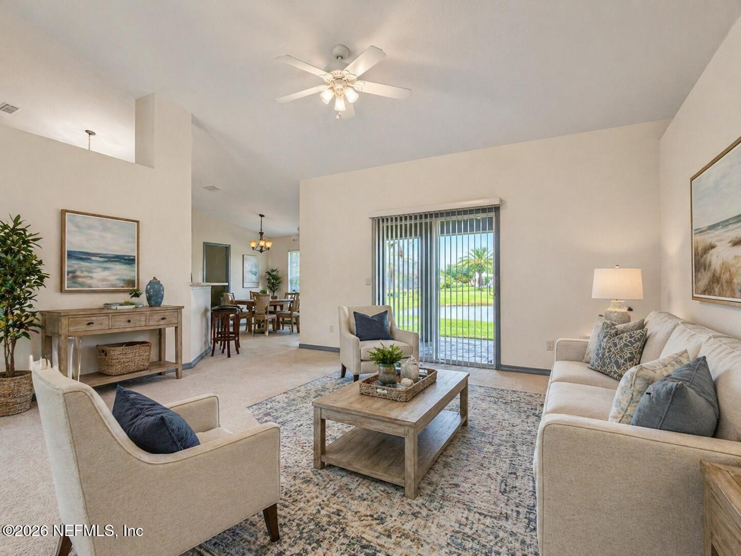 4728 Innisbrook Court North Elkton, FL 32033 - Photo 8 of 28 a living room with furniture and a couch