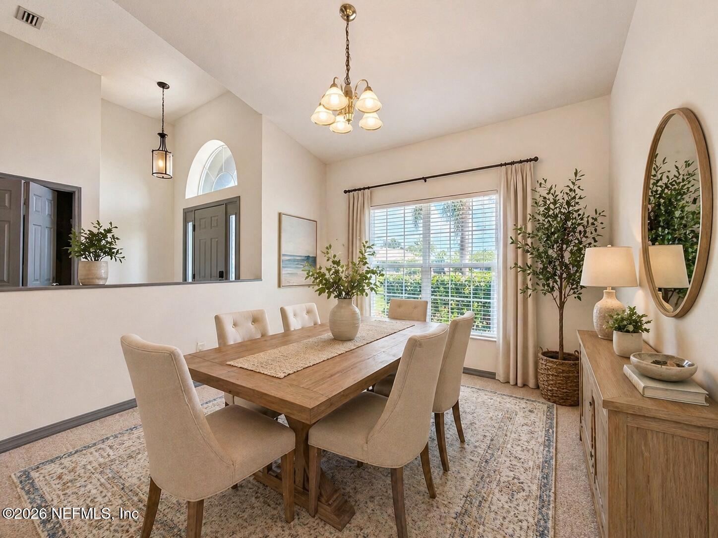 4728 Innisbrook Court North Elkton, FL 32033 - Photo 10 of 28 a view of a dining room with furniture window and wooden floor