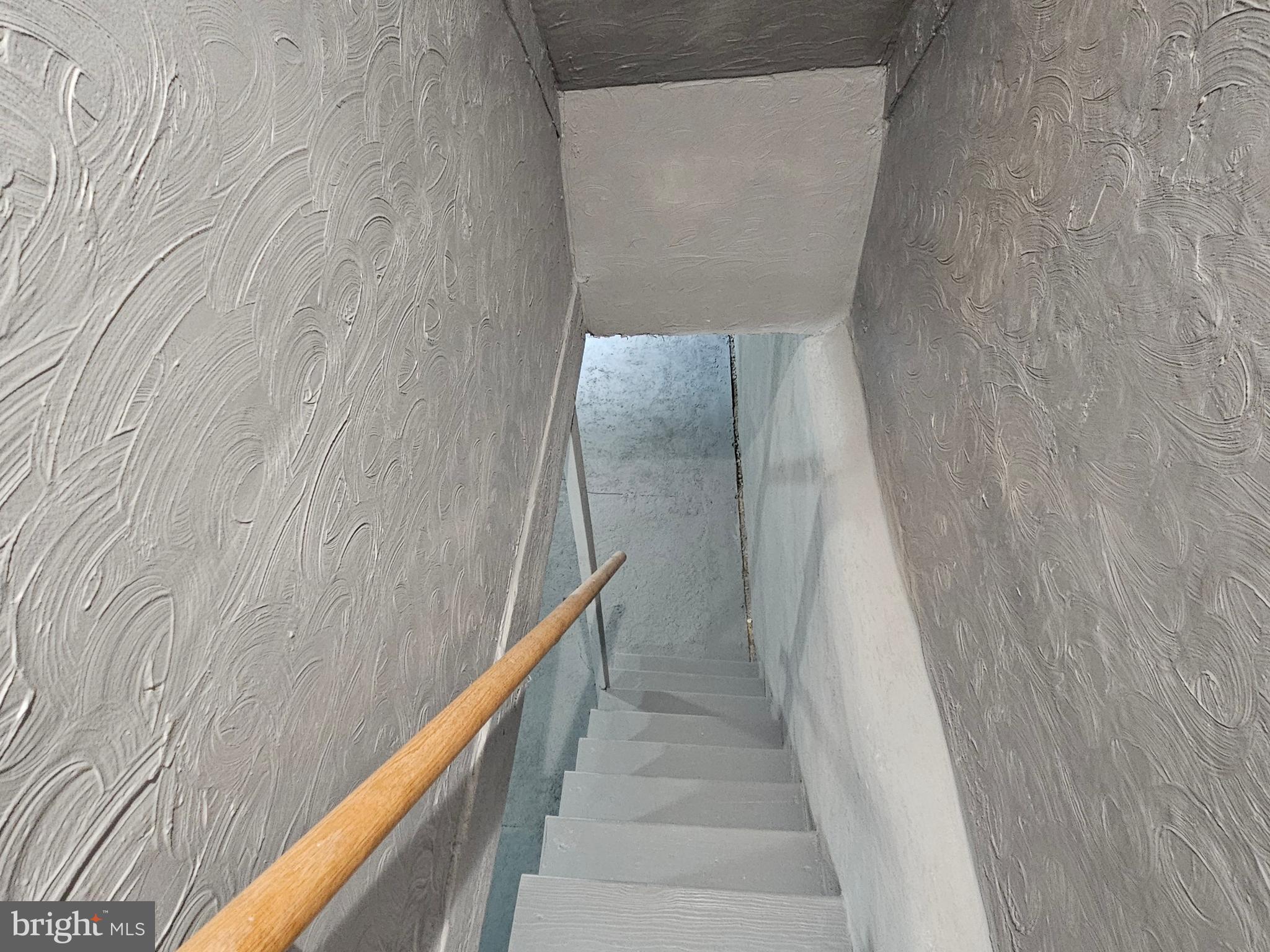 1922 Tasker Street Philadelphia, PA 19145 - Photo 33 of 37 basement staircase