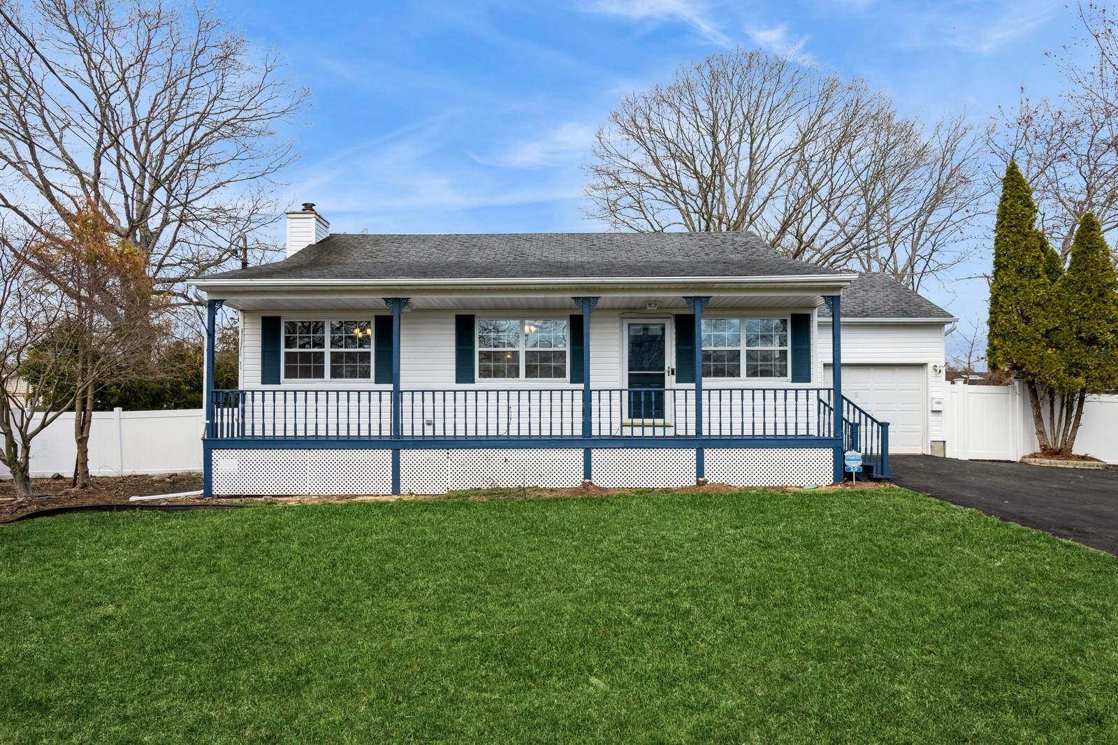 a house that has a garden in front of it