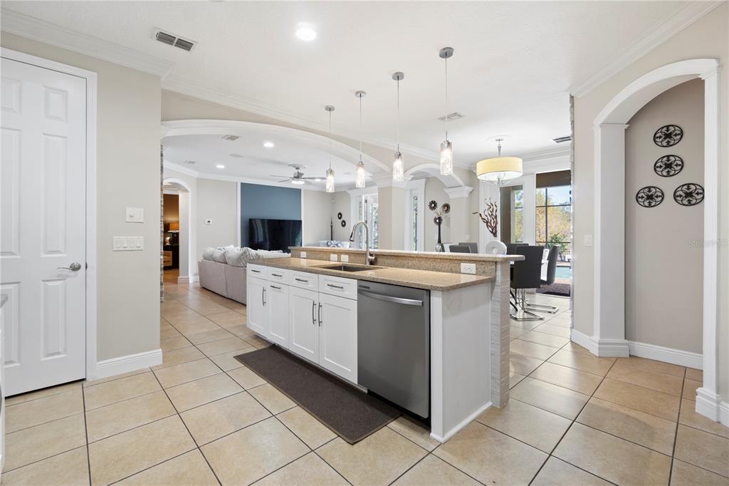 1445 Via Sangro Place Winter Park, FL 32792 - Photo 17 of 58 a large white kitchen with a large window